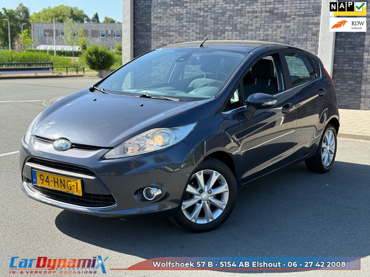 Ford Fiesta - 1.25 Ghia // AIRCO // LMV // DISTR. VV. // RIJD SCHAKELT GOED! - AutoWereld.nl