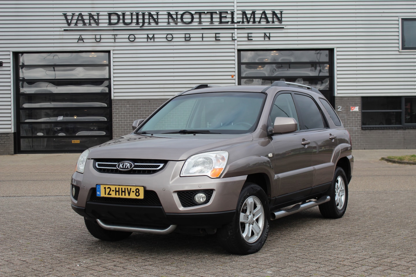 Kia Sportage - 2.7 V6 X-ecutive 4WD / Clima / Navigatie / N.A.P. - AutoWereld.nl