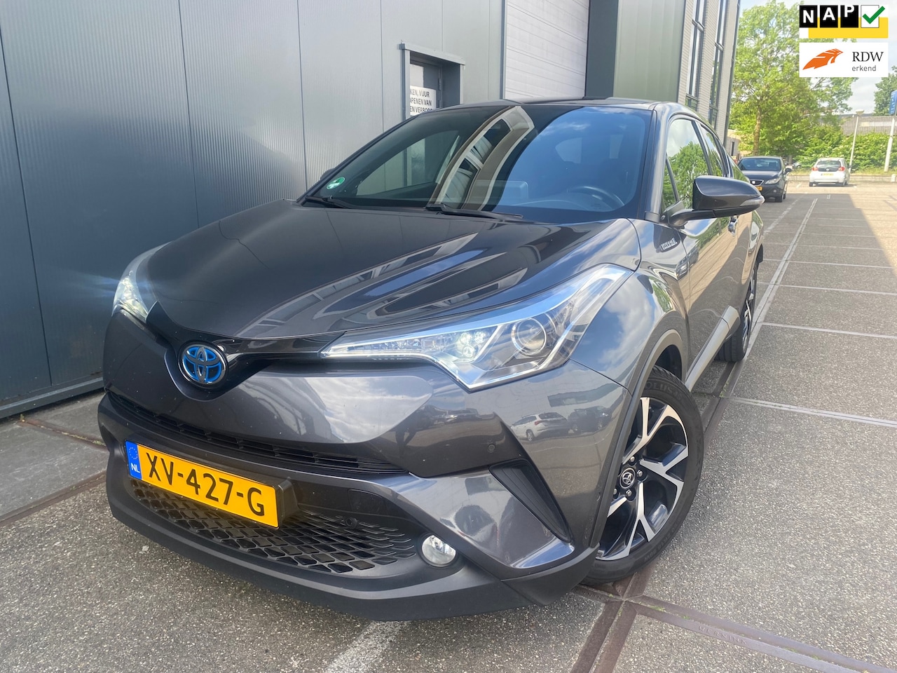 Toyota C-HR - 1.8 Hybrid Style / Automaat / Airco / Hybride / Boekjes / Goed onderhouden / Zeer nette au - AutoWereld.nl