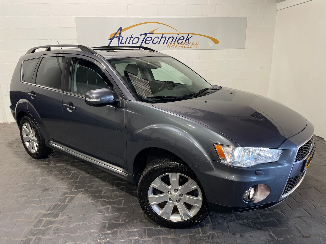 Mitsubishi Outlander - 2.0 Instyle *Schuifdak*Xenon*Nl-Auto* - AutoWereld.nl