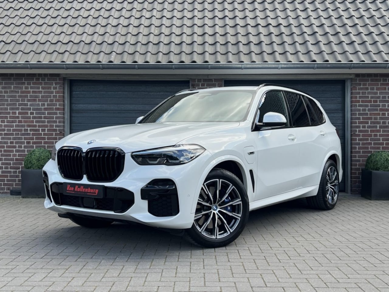 BMW X5 - X5 45e XDrive High Exe M Sport 394 pk Black Trekhaak Luchtvering - AutoWereld.nl
