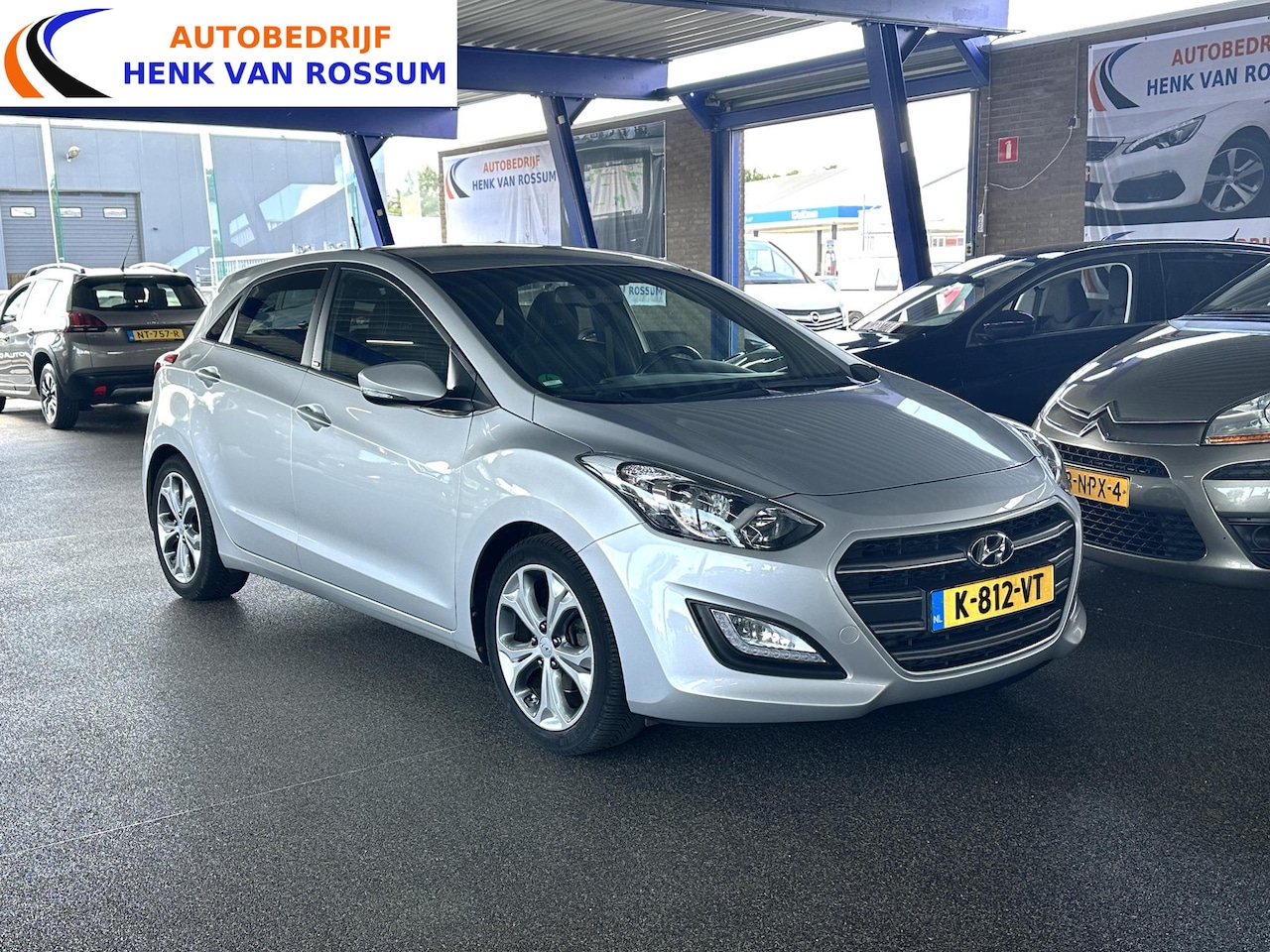 Hyundai i30 - 1.4 i Navi | Clima | PDC | Camera - AutoWereld.nl