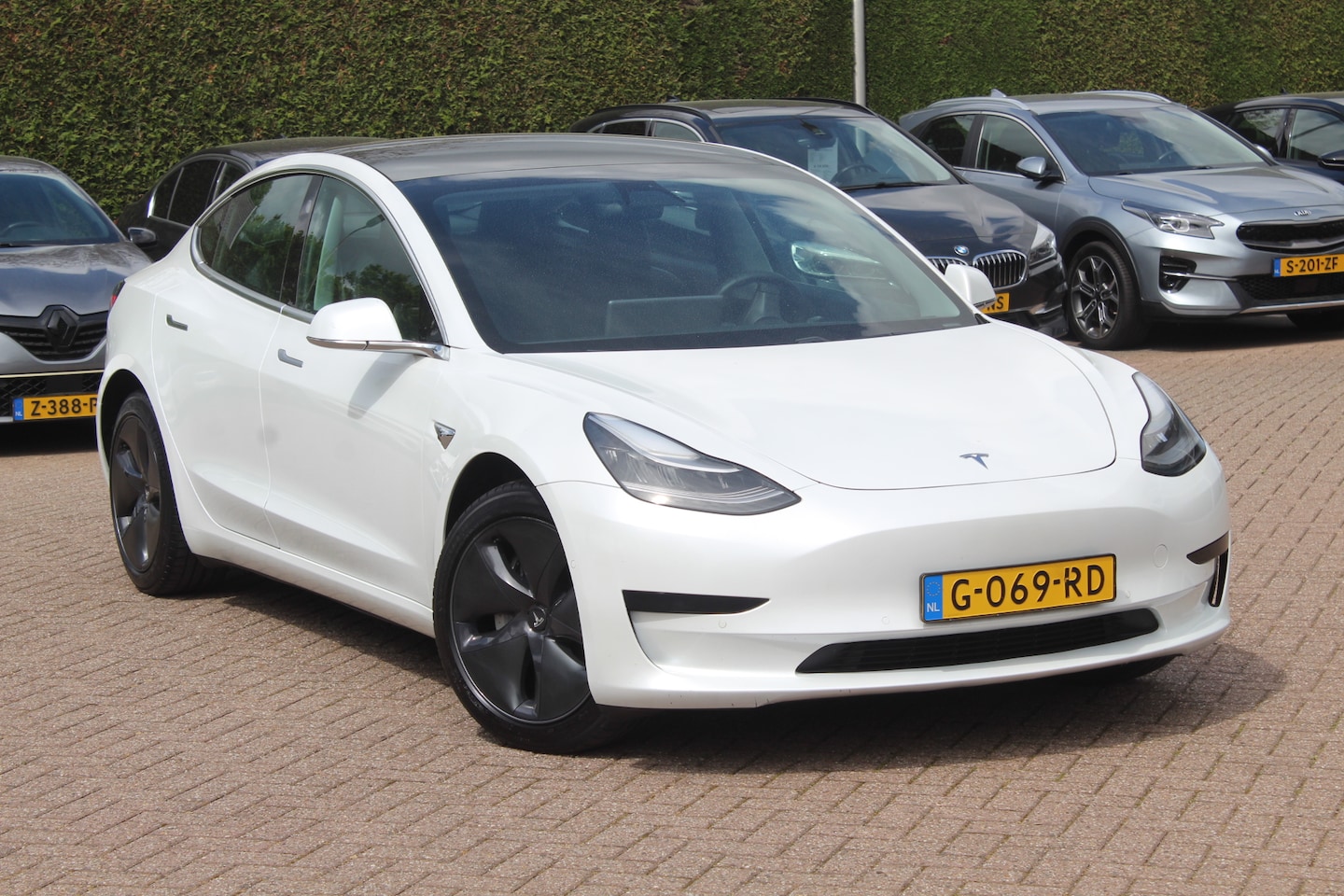 Tesla Model 3 - Standard RWD Plus 60 kWh / Autopilot / Panoramadak / Camera / Premium Audio / 18'' / Leder - AutoWereld.nl