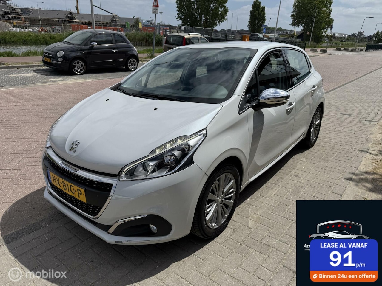 Peugeot 208 - 1.2 PureTech Allure Clima|Navi|Camera|Weinig KM - AutoWereld.nl