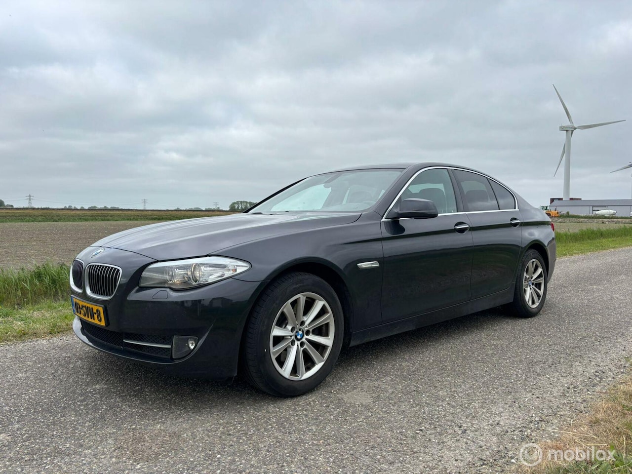 BMW 5-serie - 520i High Executive automaat 2011 184 pk donker - AutoWereld.nl