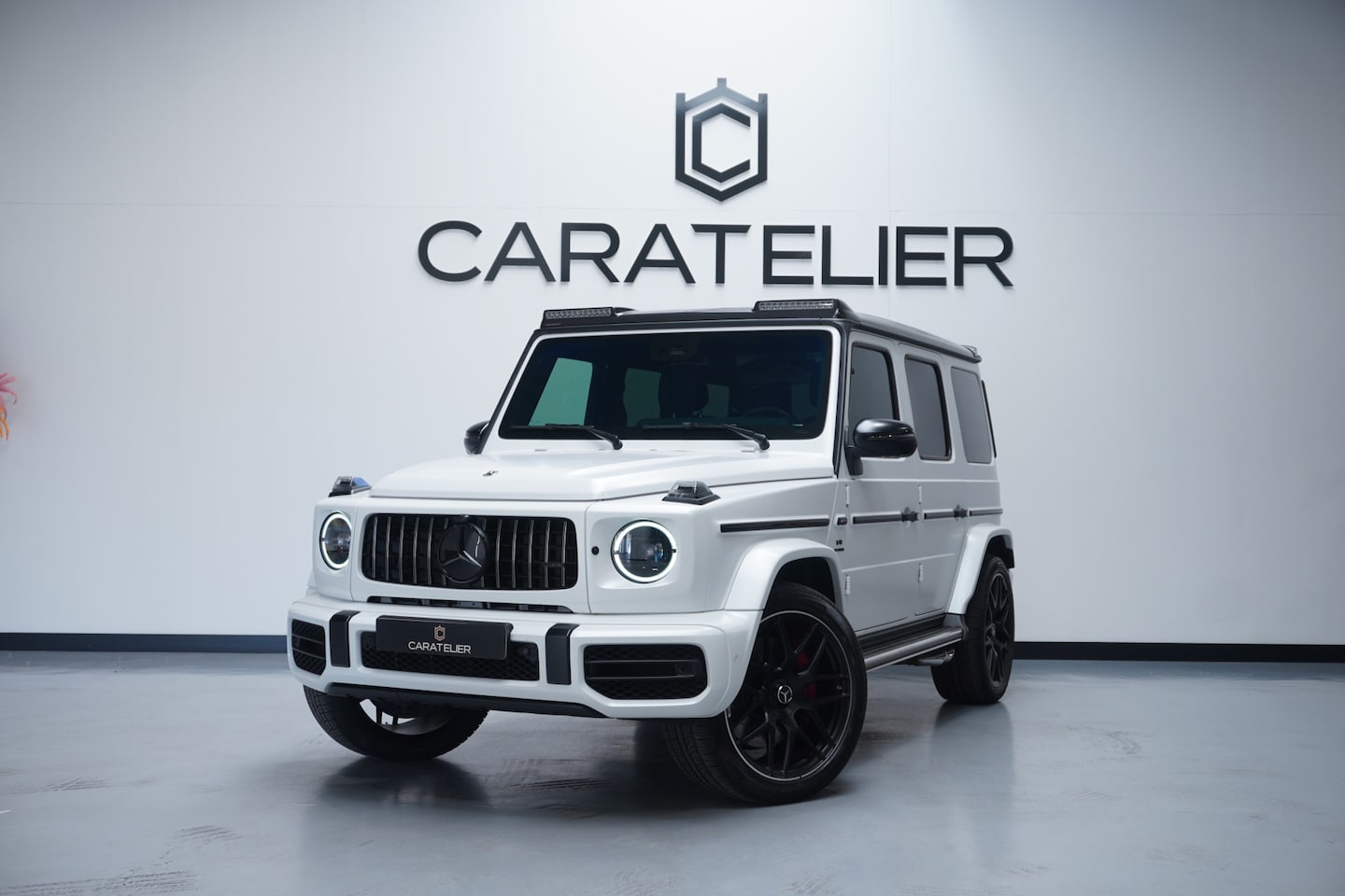 Mercedes-Benz G-klasse - 63 / GRIJS KENTEKEN / 0% BPM / MANSORY PAKKET / AKRA DOWN / FULL - AutoWereld.nl
