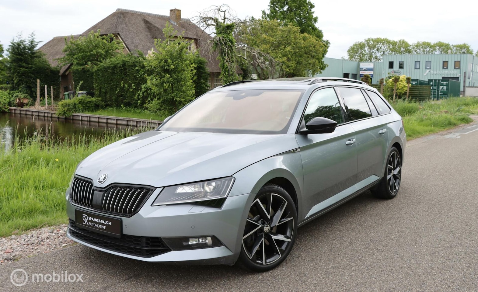 Skoda Superb Combi - 2.0 TSI 4x4 Sportline / Pano / Canton - AutoWereld.nl
