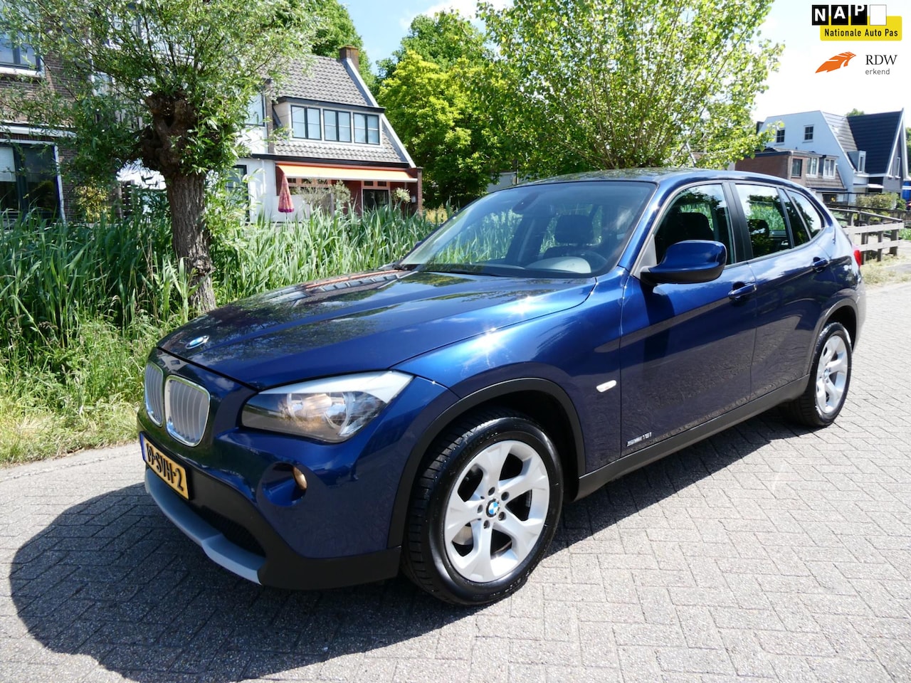 BMW X1 - SDrive18i Exe 150pk Automaat Clima Navi PDC Trekhaak Geen import - AutoWereld.nl