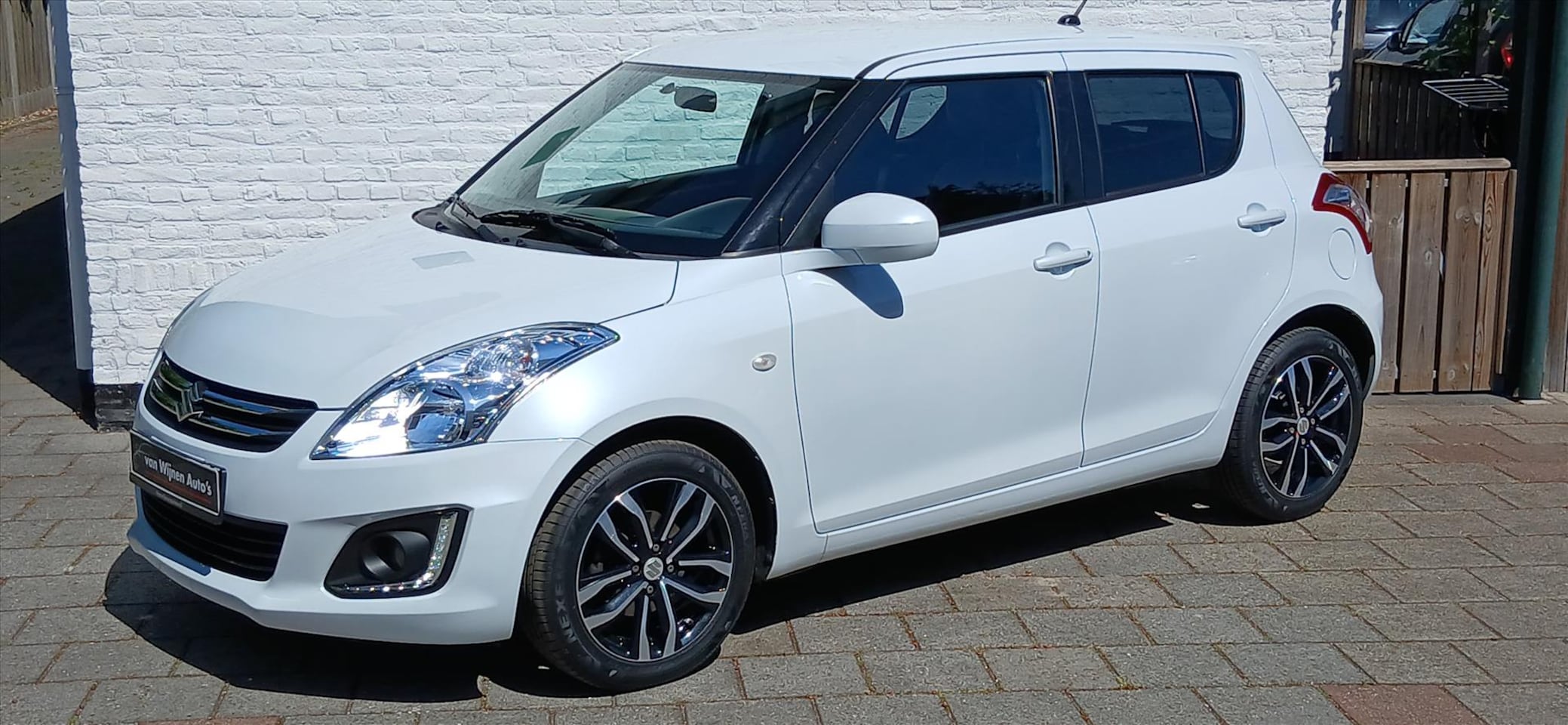 Suzuki Swift - 1.2 VVT 5drs stijl ,cruise ,airco,lmv 73000 km - AutoWereld.nl