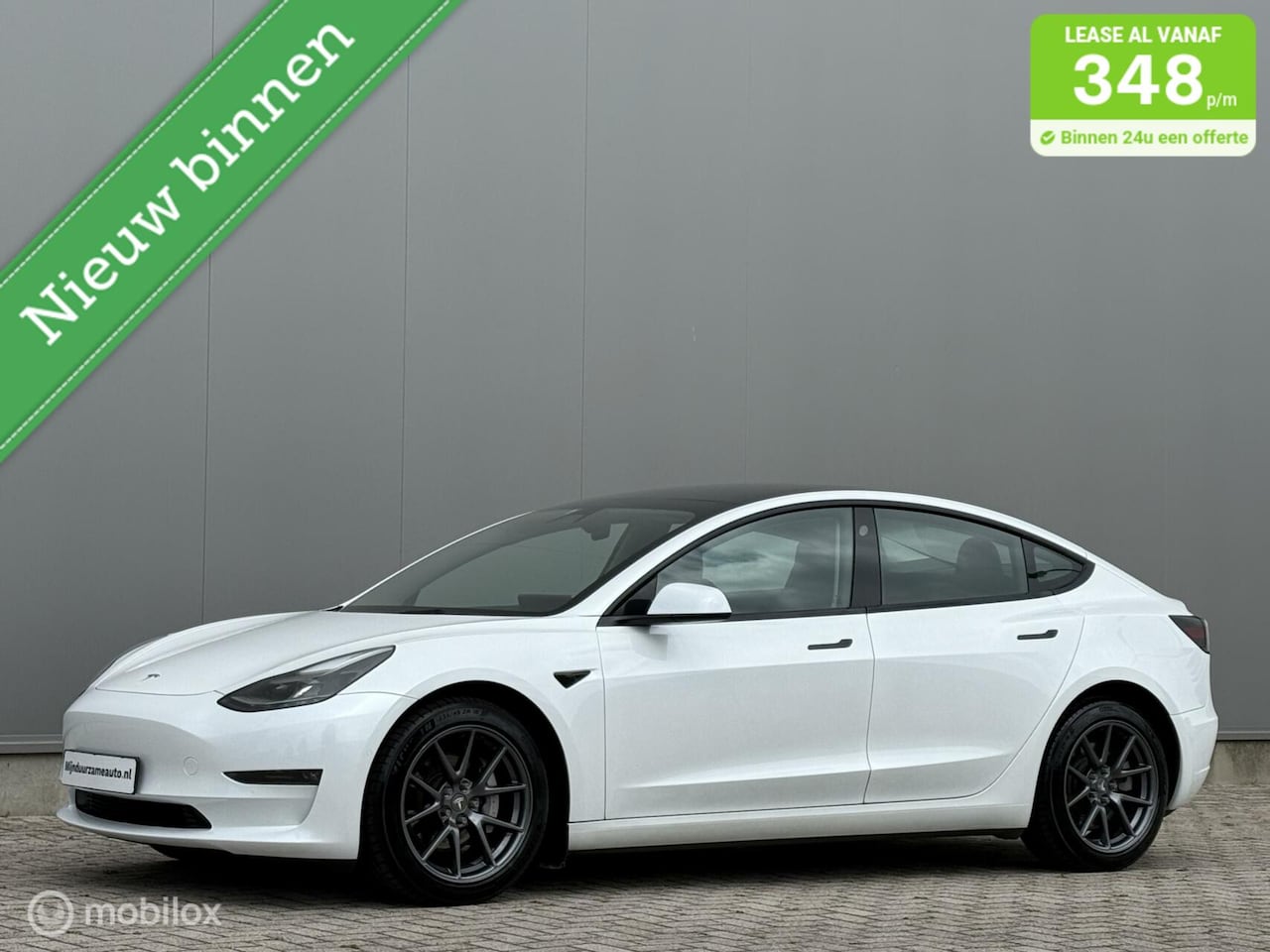 Tesla Model 3 - Long Range RWD Long Range AWD 75 kWh - Facelift - SOH 90 % - AutoWereld.nl