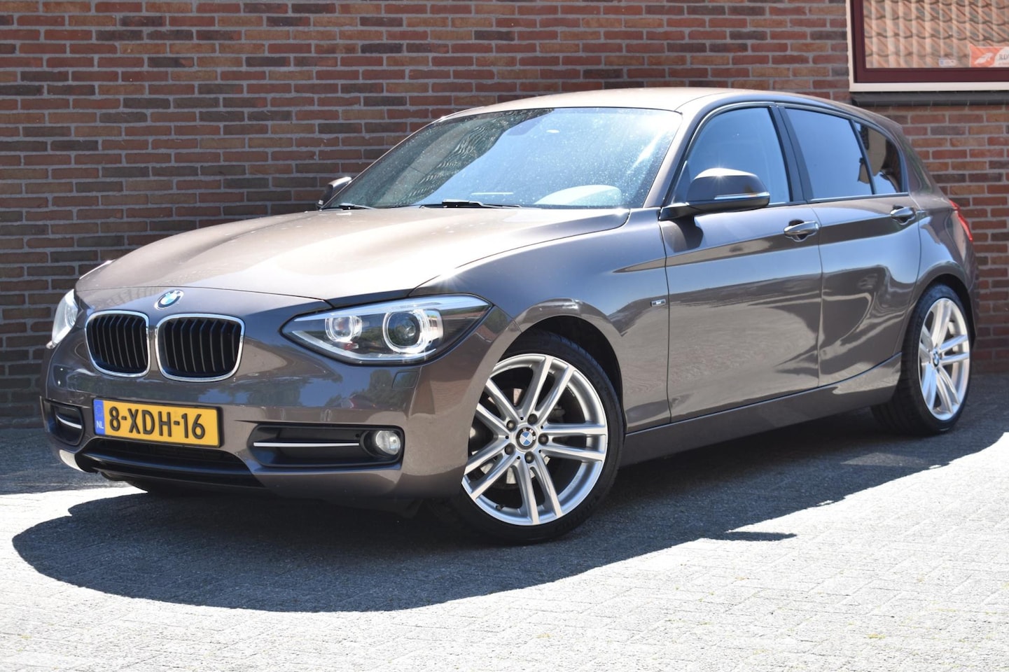 BMW 1-serie - 116d EDE Corporate Lease Executive '14 Xenon Navi Clima Cruise - AutoWereld.nl