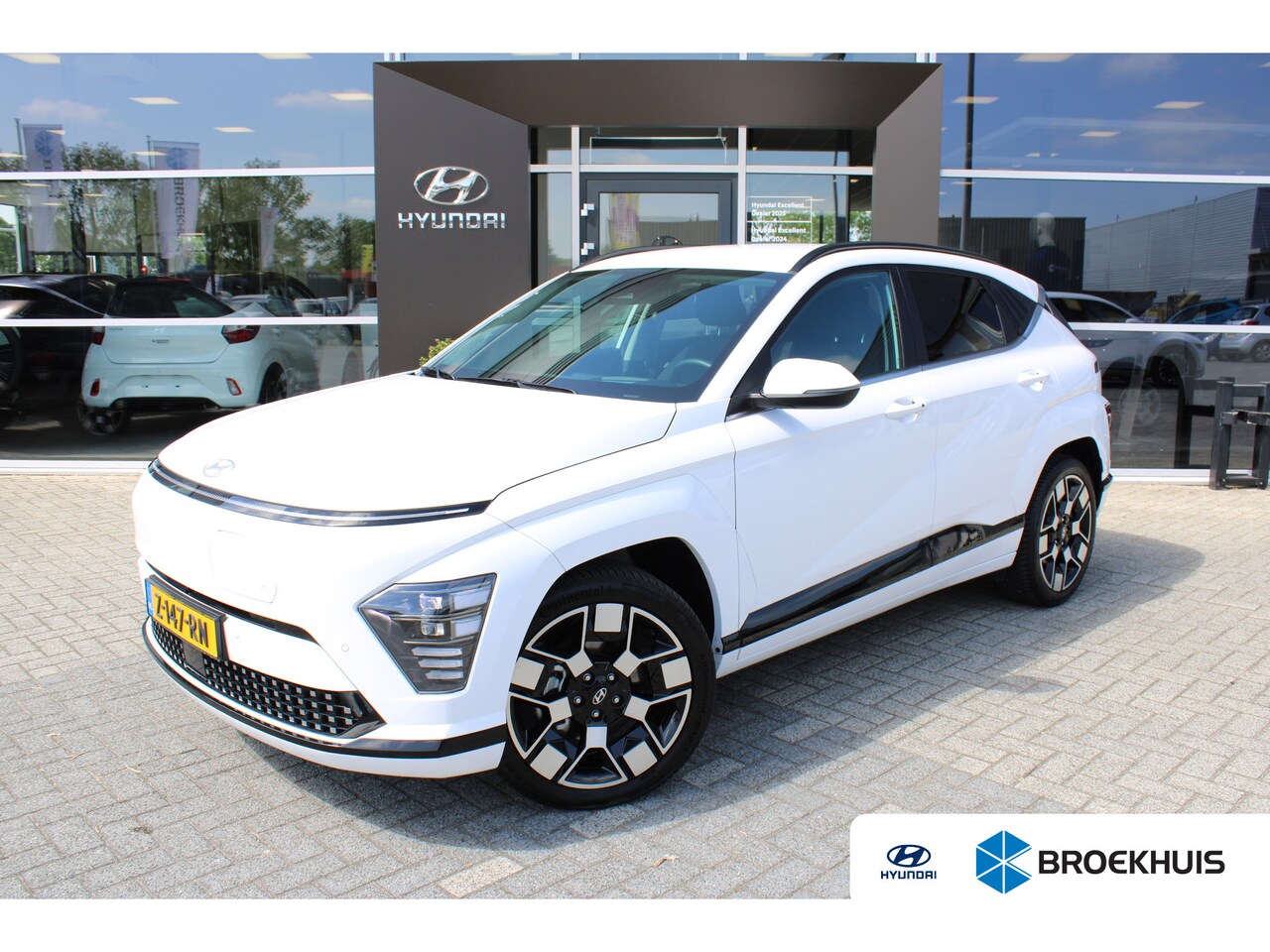 Hyundai Kona Electric - Comfort Smart 65.4 kWh | Stoelbekleding, stof | Achteruitrijcamera | Parkeersensoren achte - AutoWereld.nl