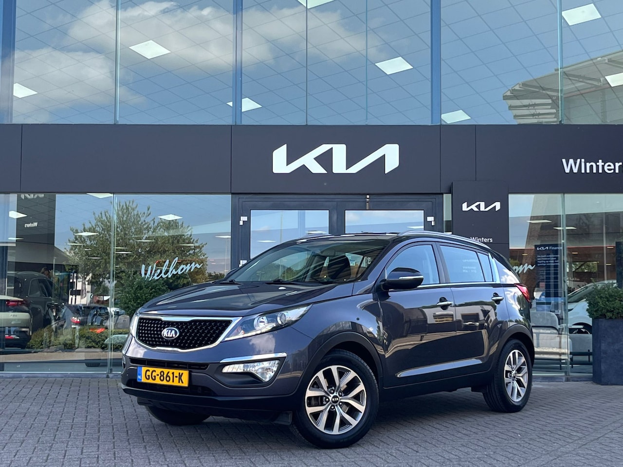 Kia Sportage - 1.6i GDi BusinessLine | Climate Control  | Cruise Control | Navigatie | Camera | Trekhaak - AutoWereld.nl