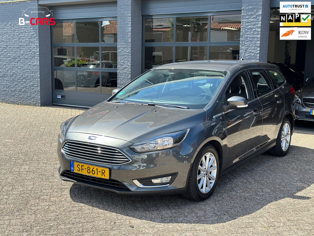 Ford Focus Wagon - 1.5 Titanium Aut|Navi|Cruisec|Autopark|Trkhk|Nap!! - AutoWereld.nl