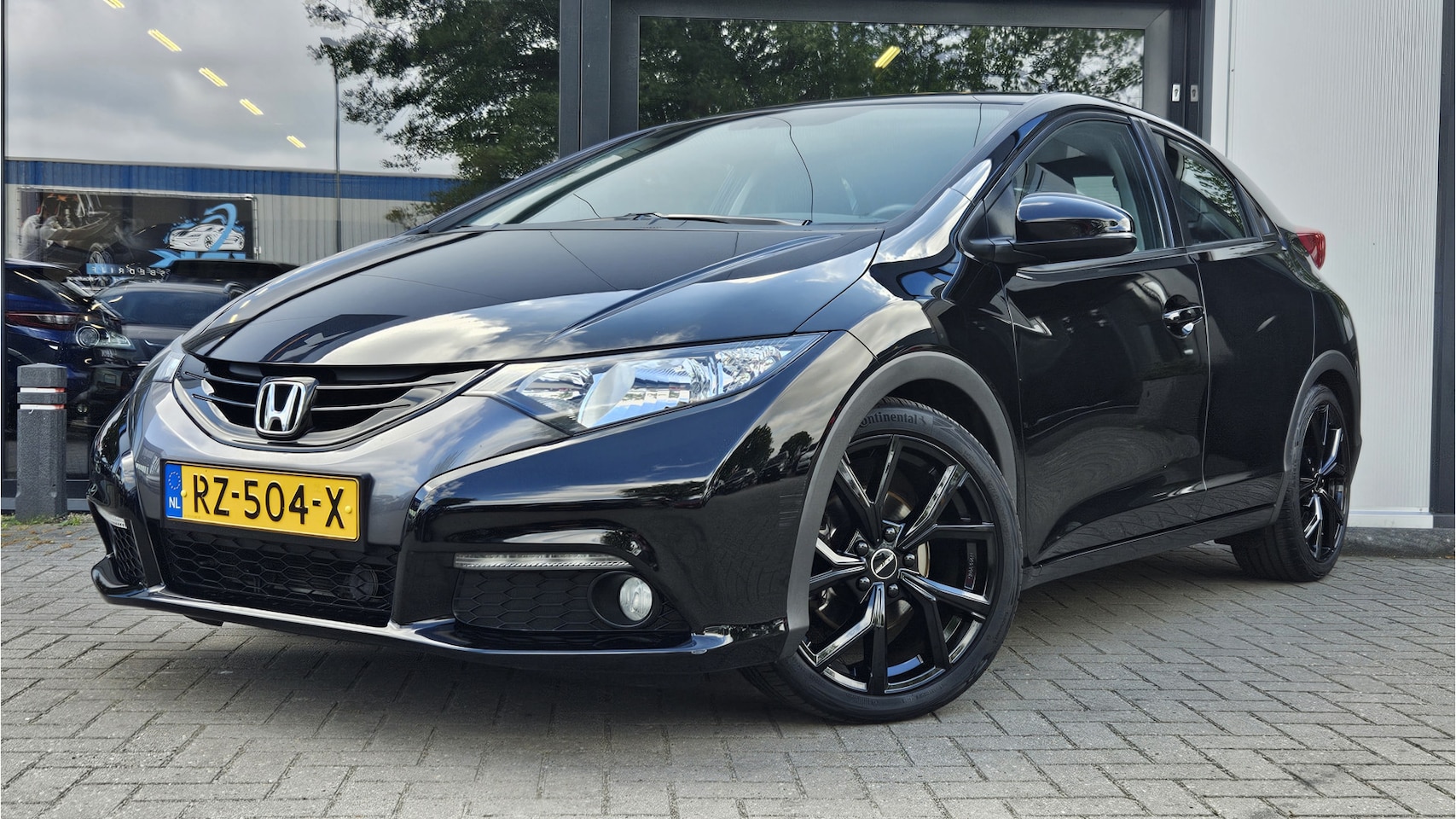 Honda Civic - 1.8 Sport + LM VELGEN + CAMERA + APPLE CARPLAY + KLIMA - AutoWereld.nl