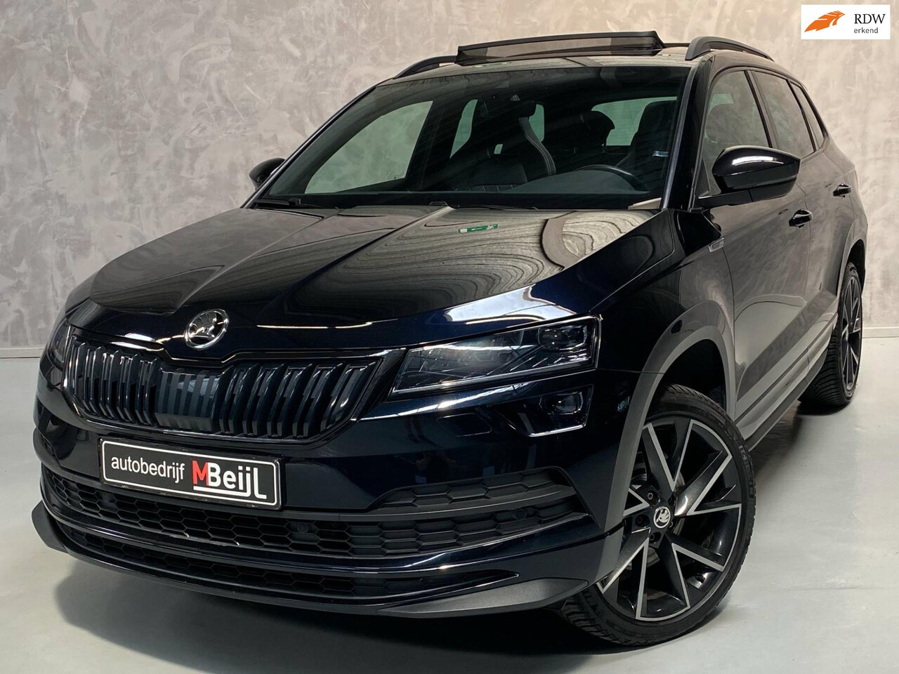 Skoda Karoq - 1.5 TSI ACT Sportline Business /Pano /Camera /Virtueel dashboard - AutoWereld.nl