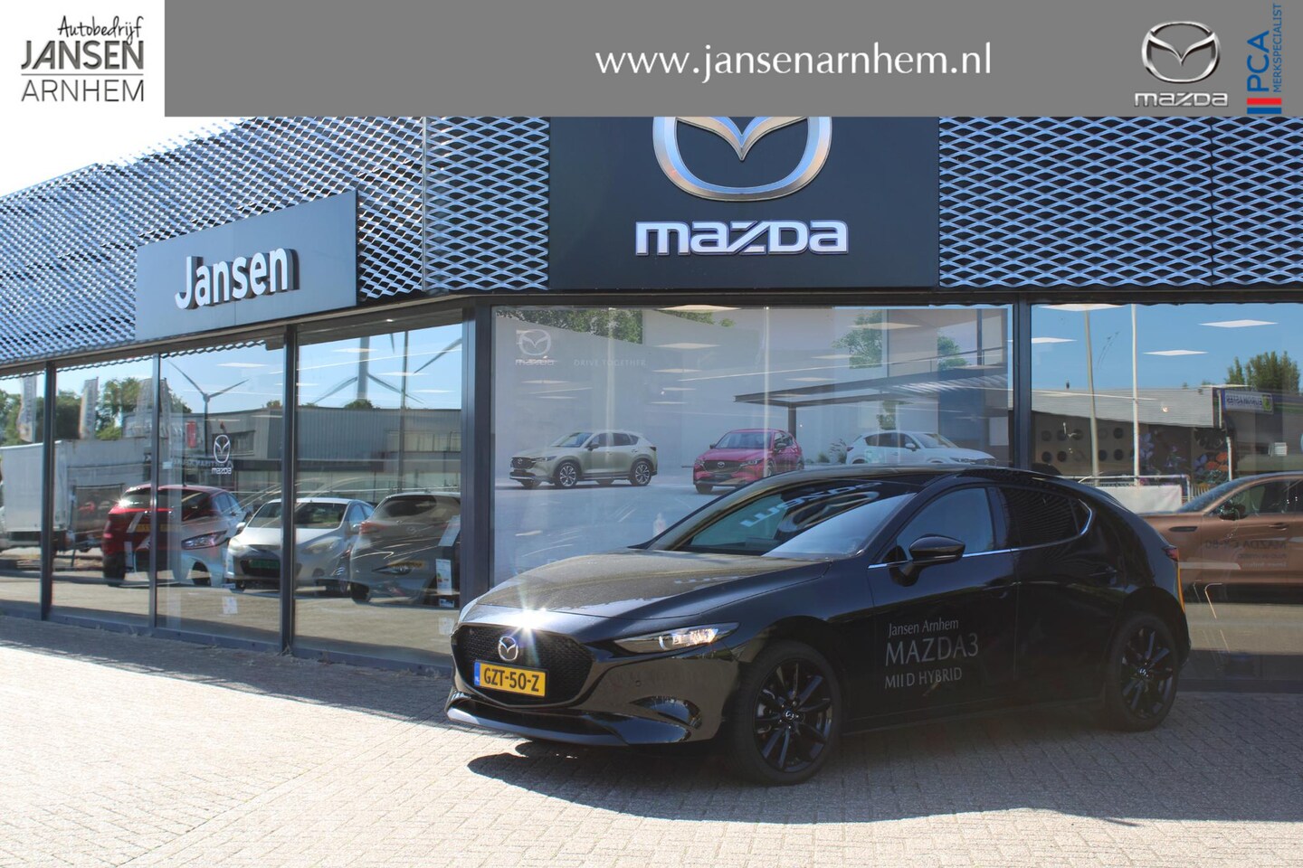 Mazda 3 - HB 2.0 e-SkyActiv-X 186 M Hybrid Nagisa , Demovoordeel €3.740,-, Bruin Leder, Bose, Navi, - AutoWereld.nl
