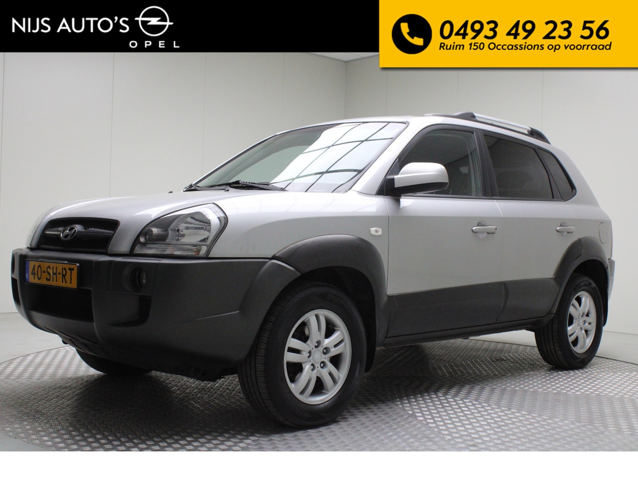 Hyundai Tucson - 2.0i Style | zo mee | trekhaak | climate control | cruise control | radio cd | LM reserve - AutoWereld.nl