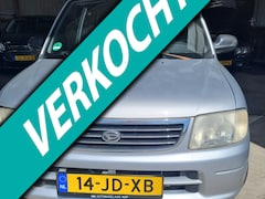 Daihatsu Cuore - 1.0-12V DVVT STi Koopje
