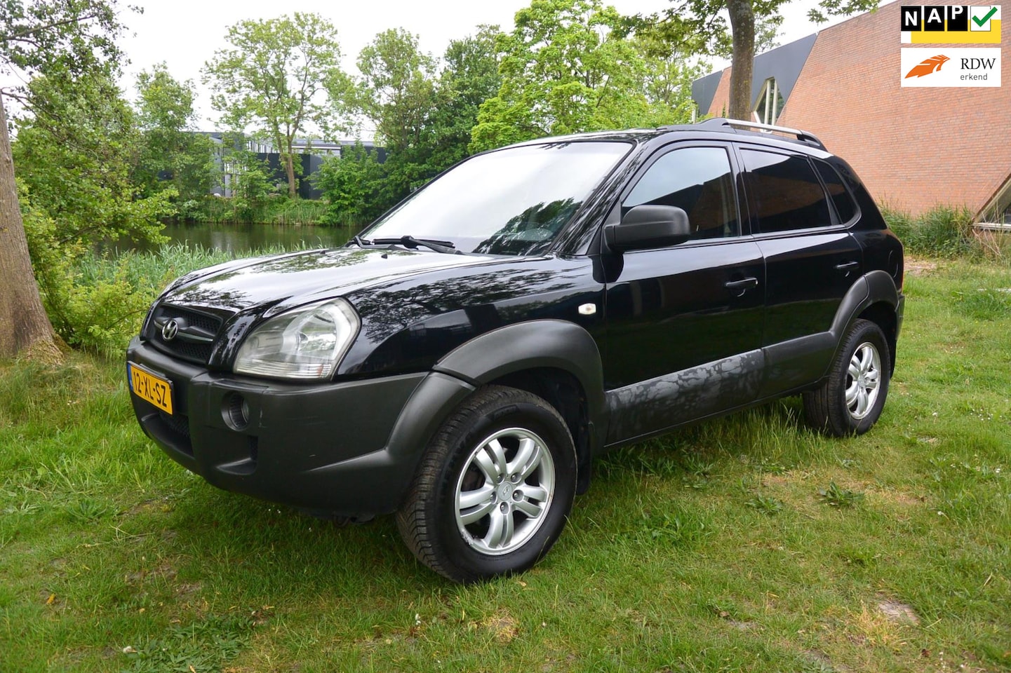 Hyundai Tucson - 2.0i Dynamic*airco*cruise*trekhaak - AutoWereld.nl