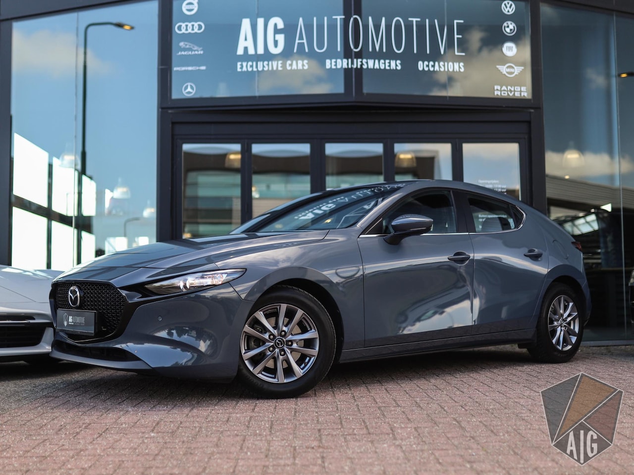 Mazda 3 - 2.0 e-SkyActiv-G M Hybrid 122 Comfort Bose | Camera | Memory | Trekhaak | ACC | Stoel/Stuu - AutoWereld.nl