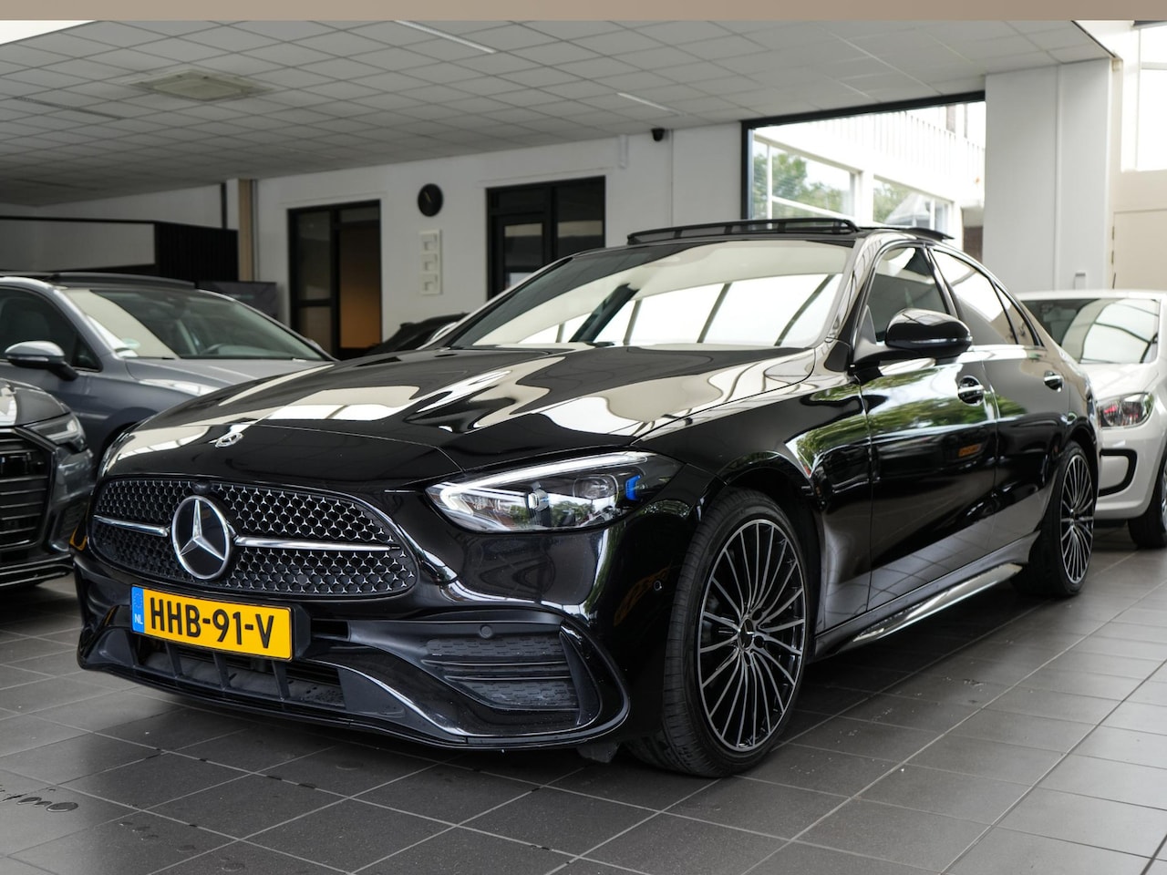 Mercedes-Benz C-klasse - 300 e AMG Line | PANO | SFEER | MASSAGE | HUD - AutoWereld.nl