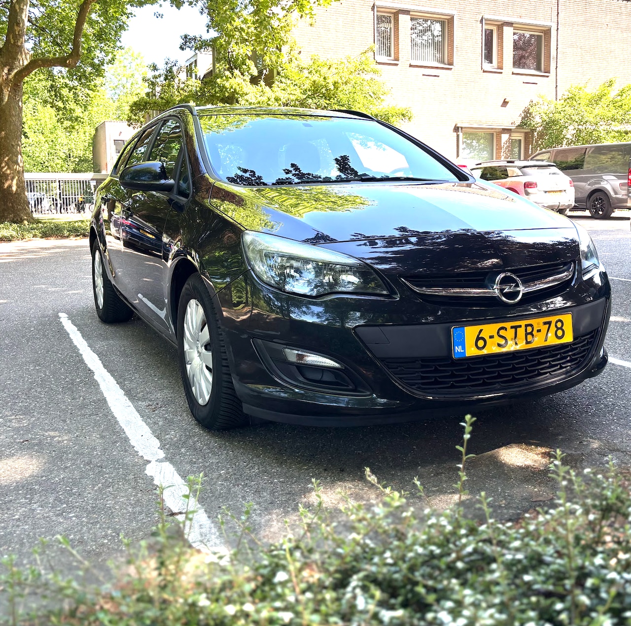 Opel Astra Sports Tourer - 1.4 Turbo Cosmo - AutoWereld.nl