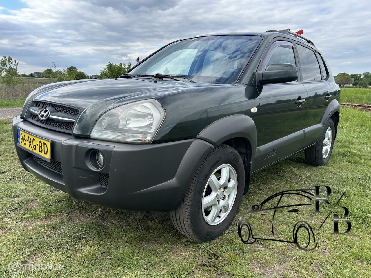 Hyundai Tucson - 2.0i Dynamic LPG/G3 AIRCO CRUISE TREKHAAK - AutoWereld.nl