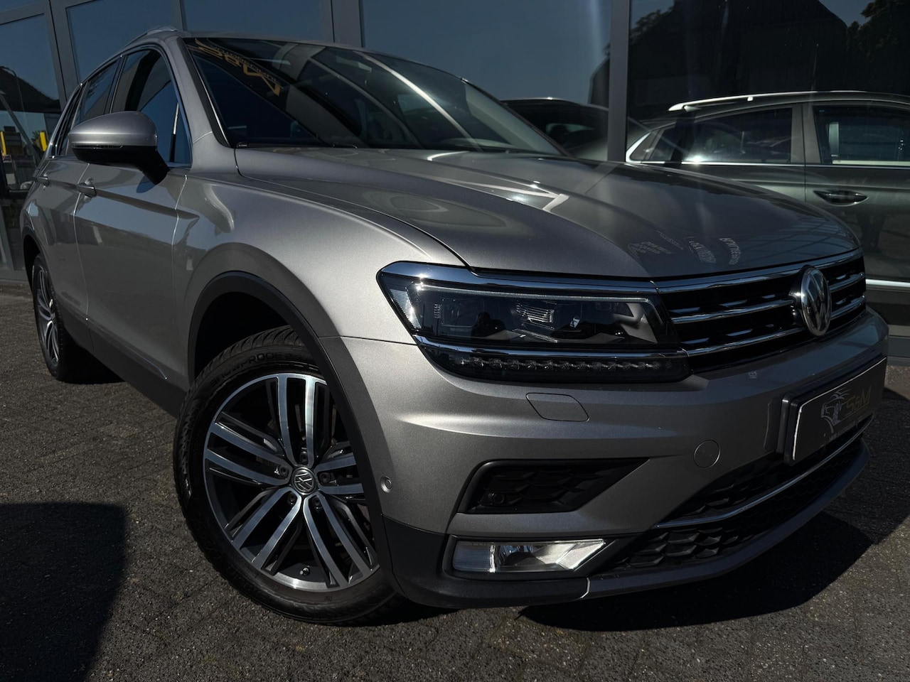Volkswagen Tiguan - 2.0 TSI 4Motion Highline 2.0 TSI 4Motion Highline - AutoWereld.nl