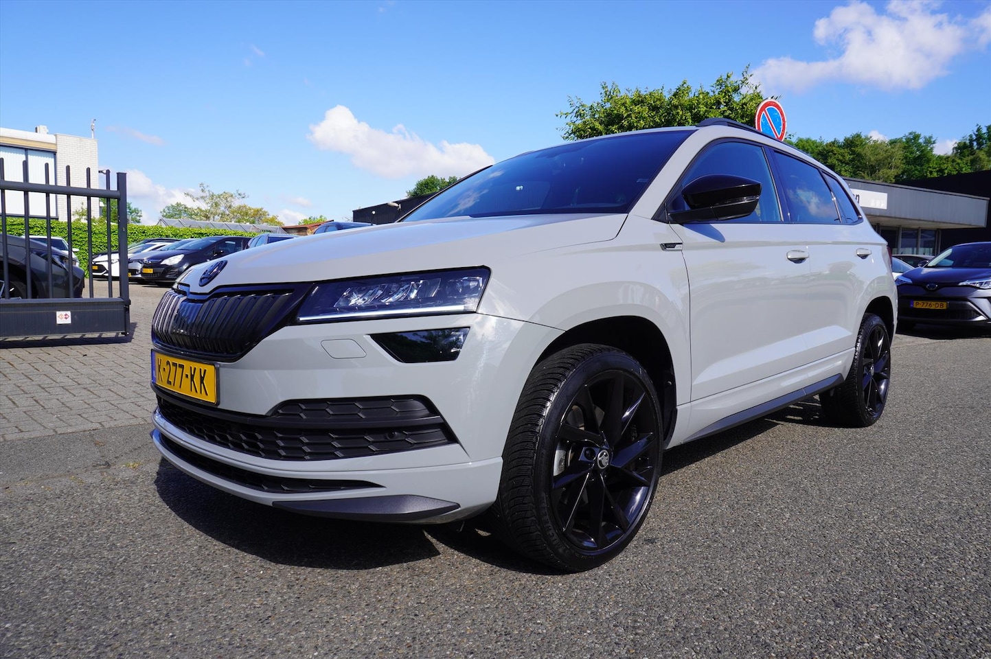 Skoda Karoq - 1.5 TSI ACT Greentech 150pk Sportline Buss Clima Navi Xenon Canton Sound - AutoWereld.nl