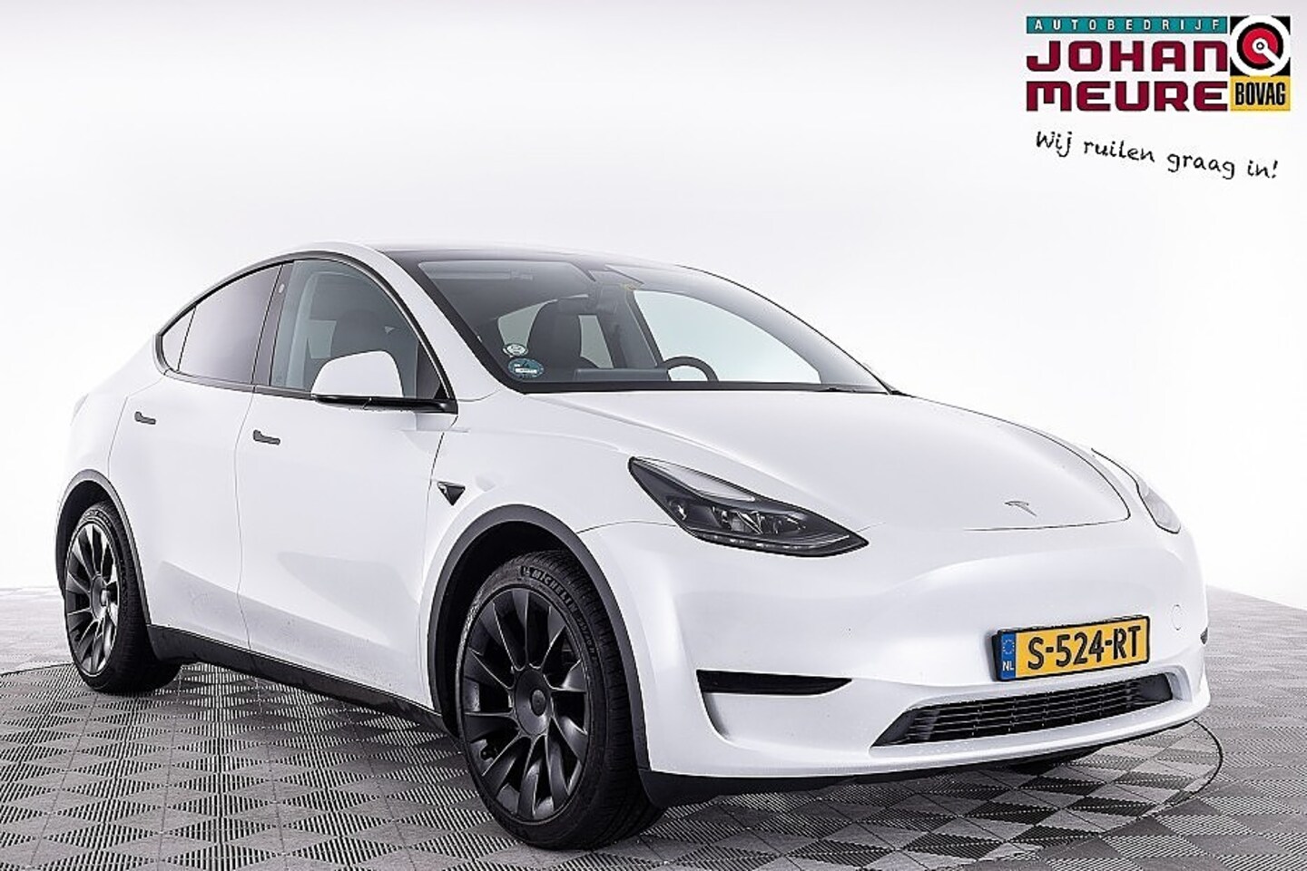 Tesla Model Y - RWD 58 kWh | PANORAMADAK | LEDER - AutoWereld.nl