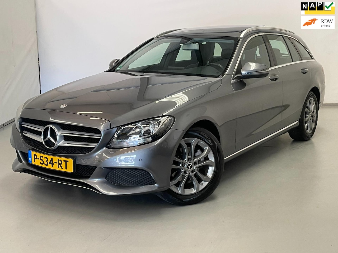 Mercedes-Benz C-klasse Estate - 180 / Pano / Stoelverwarming / Leder / Trekhaak - AutoWereld.nl