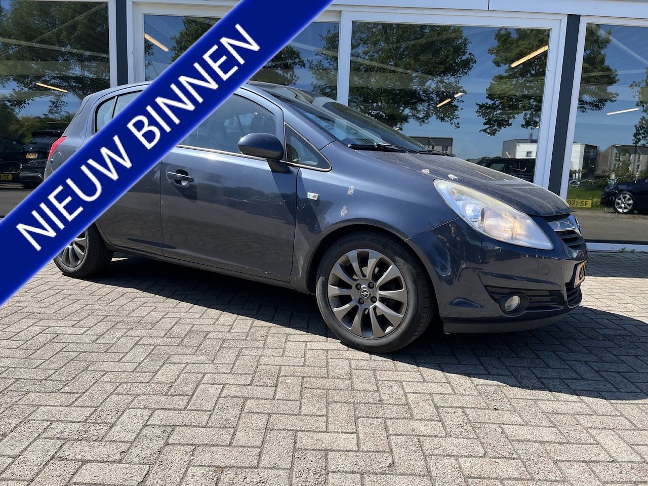 Opel Corsa - 1.4-16V Enjoy Airco / Cruise / LMV - AutoWereld.nl
