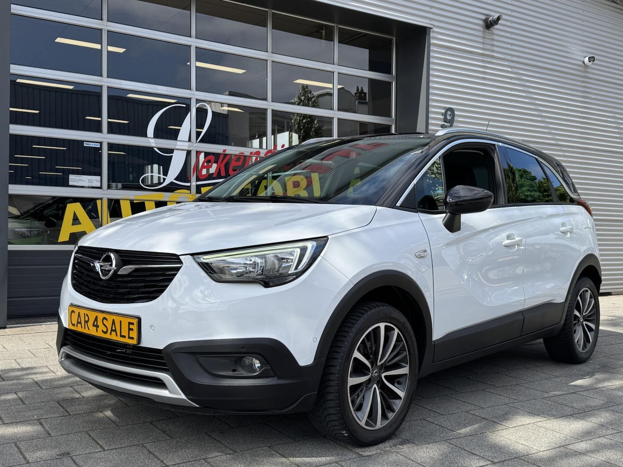 Opel Crossland X - 1.2 Turbo Design - Automaat I Navigatie I Airco I PDC/Camera I Sport velgen I Dealer onder - AutoWereld.nl