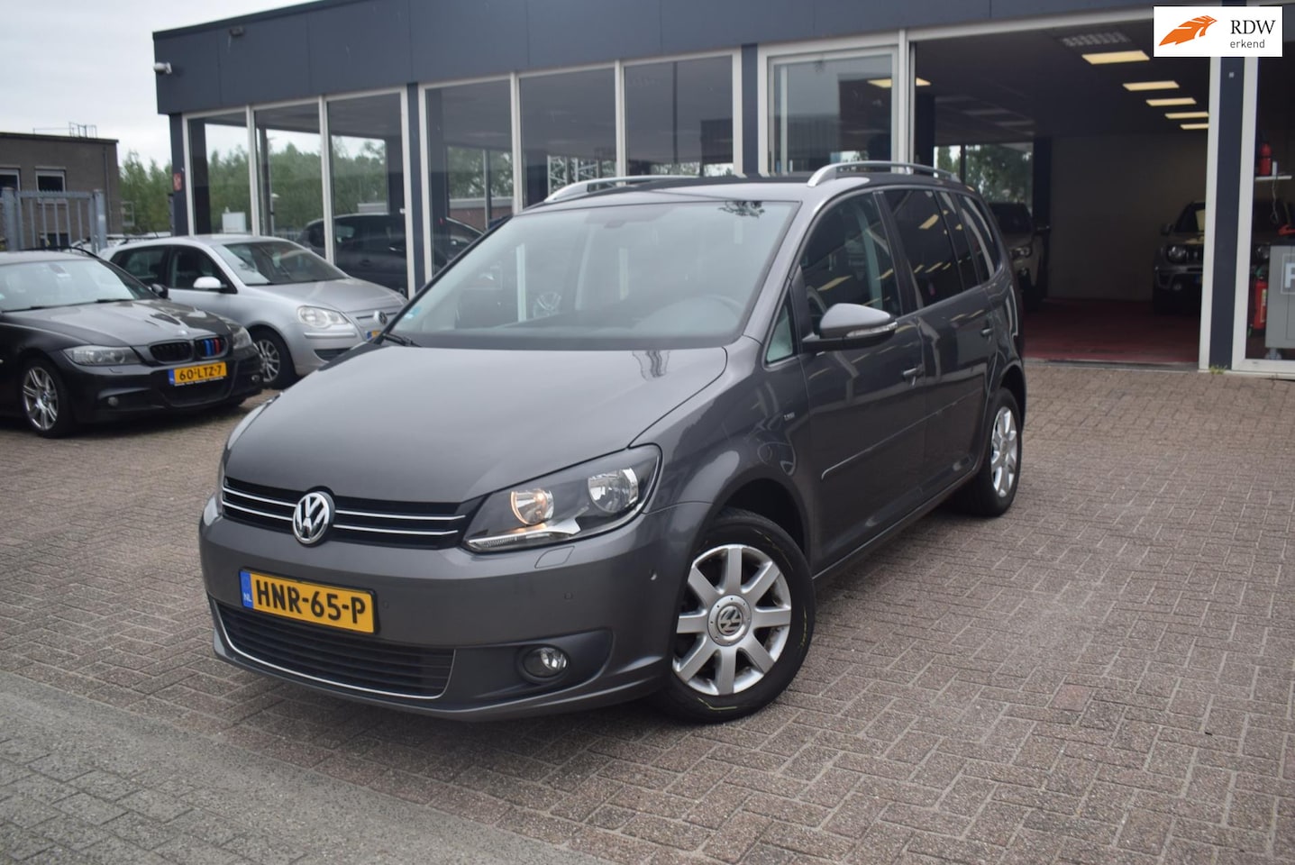 Volkswagen Touran - 1.4 TSI CUP EDITION Comfortline |AUTOMAAT|CLIMATE CONTROL | CRUISE CONTROL |NAVI|VOOR EN A - AutoWereld.nl