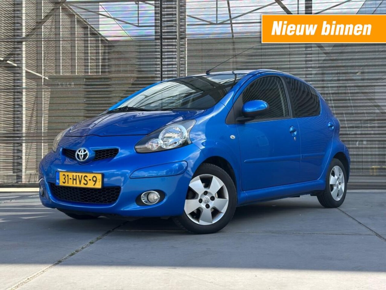Toyota Aygo - 1.0-12V DYNAMIC BLUE AIRCO/LM VELGEN APK 29-4-2026 !! - AutoWereld.nl