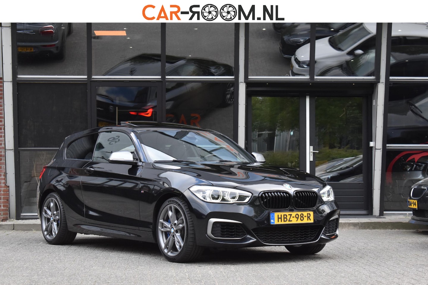 BMW 1-serie - M140i xDrive High Executive Pano Camera H/K Leder Elekstoel - AutoWereld.nl