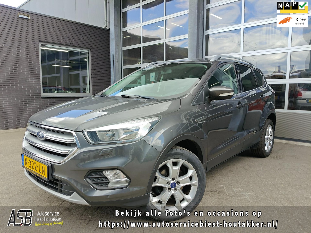 Ford Kuga - 1.5 EcoBoost Titanium | Carplay | Keyless | Trekhaak | Cruise + Climate Control | Sensoren - AutoWereld.nl