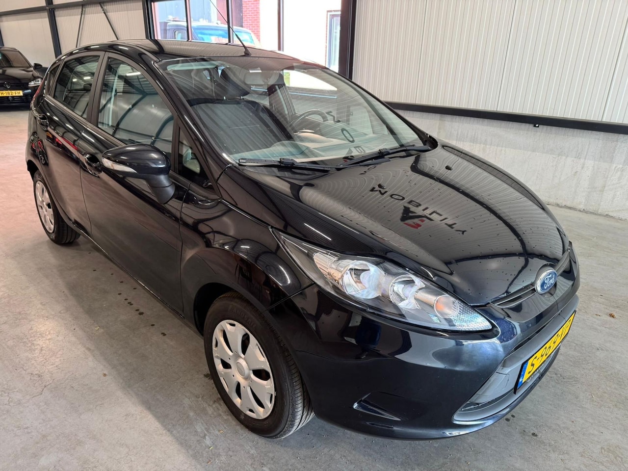 Ford Fiesta - 1.25 Ghia 2011 5DRS Airco NEW APK - AutoWereld.nl
