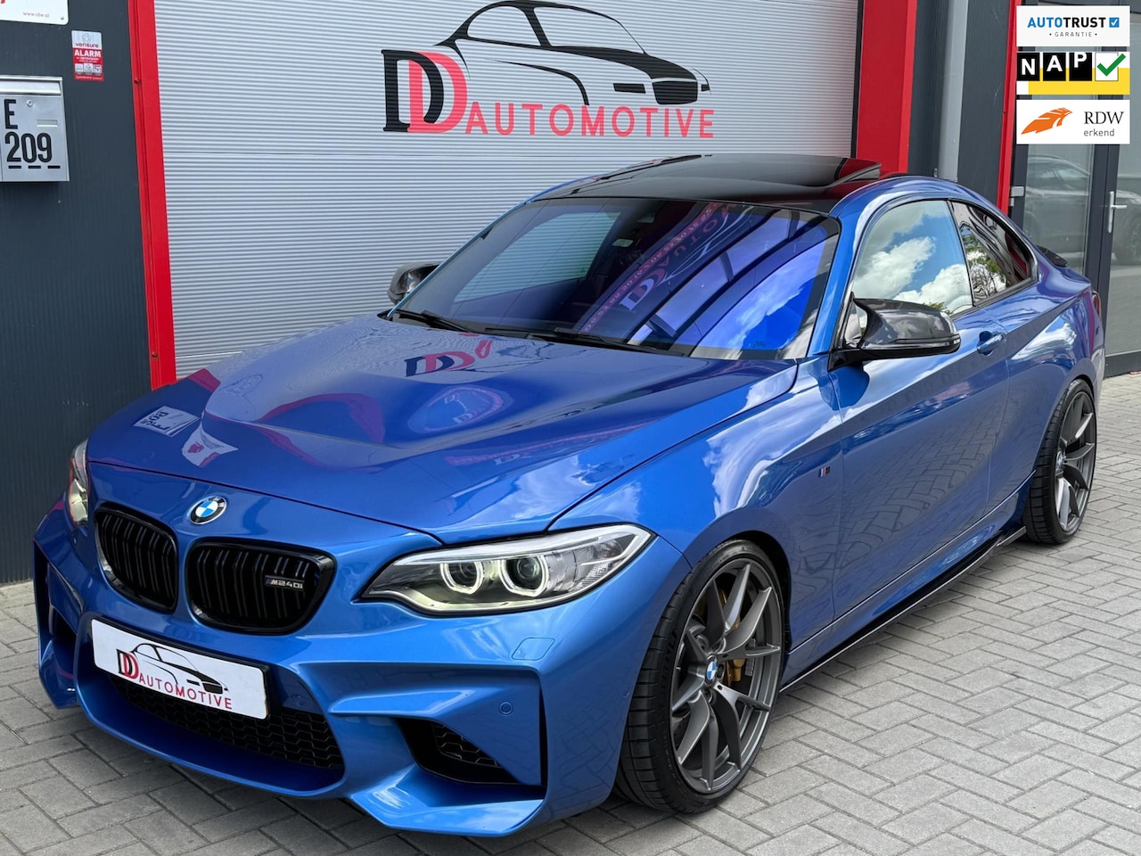 BMW 2-serie Coupé - M240i xDrive High Executive DAK/CRUISE/LANE/H&K/CAMERA/ALCANTARA - AutoWereld.nl