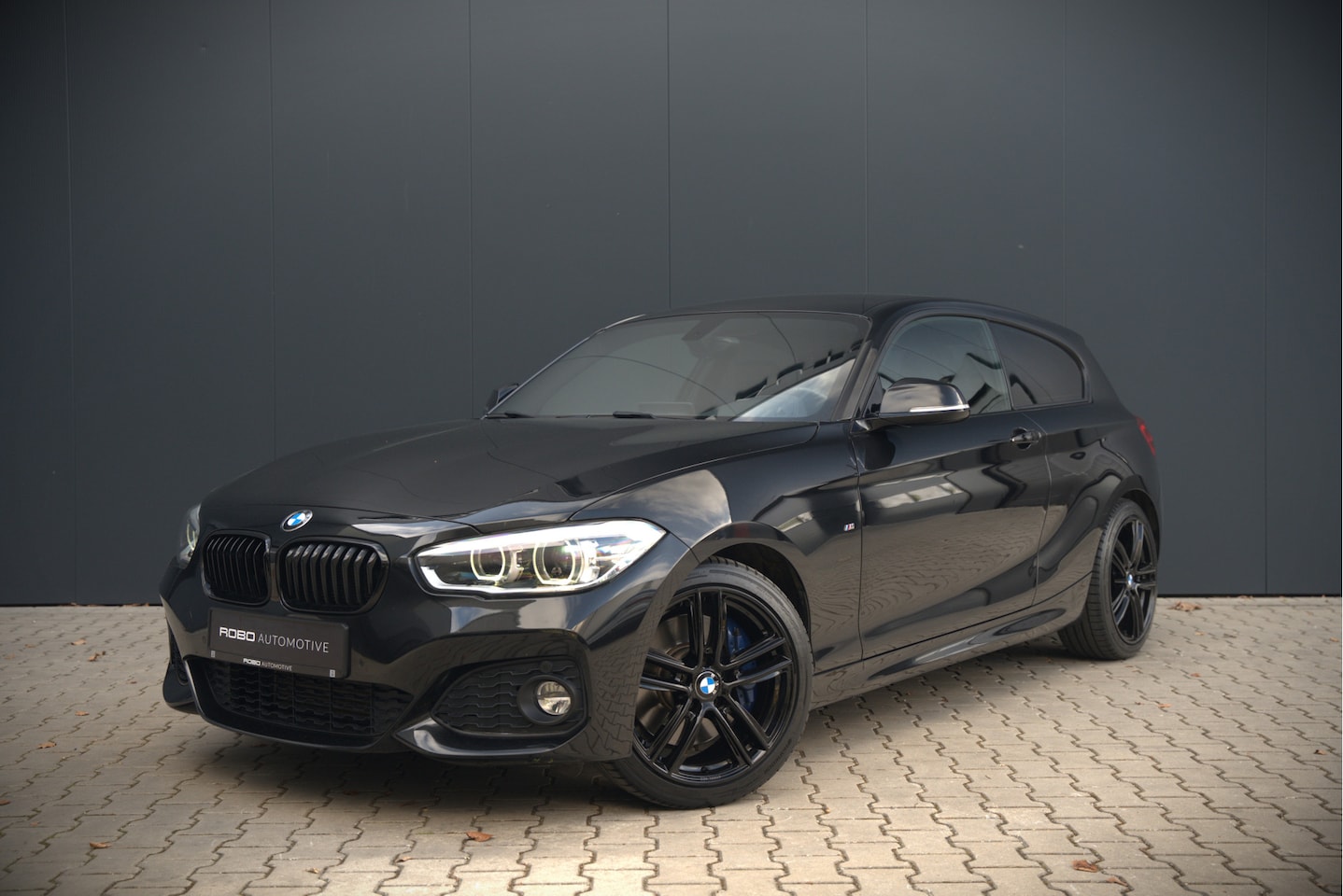 BMW 1-serie - 118i High Executive M Sport | Stoelverwarming | Navigatie | Cruise Control | Keyless | LCI - AutoWereld.nl