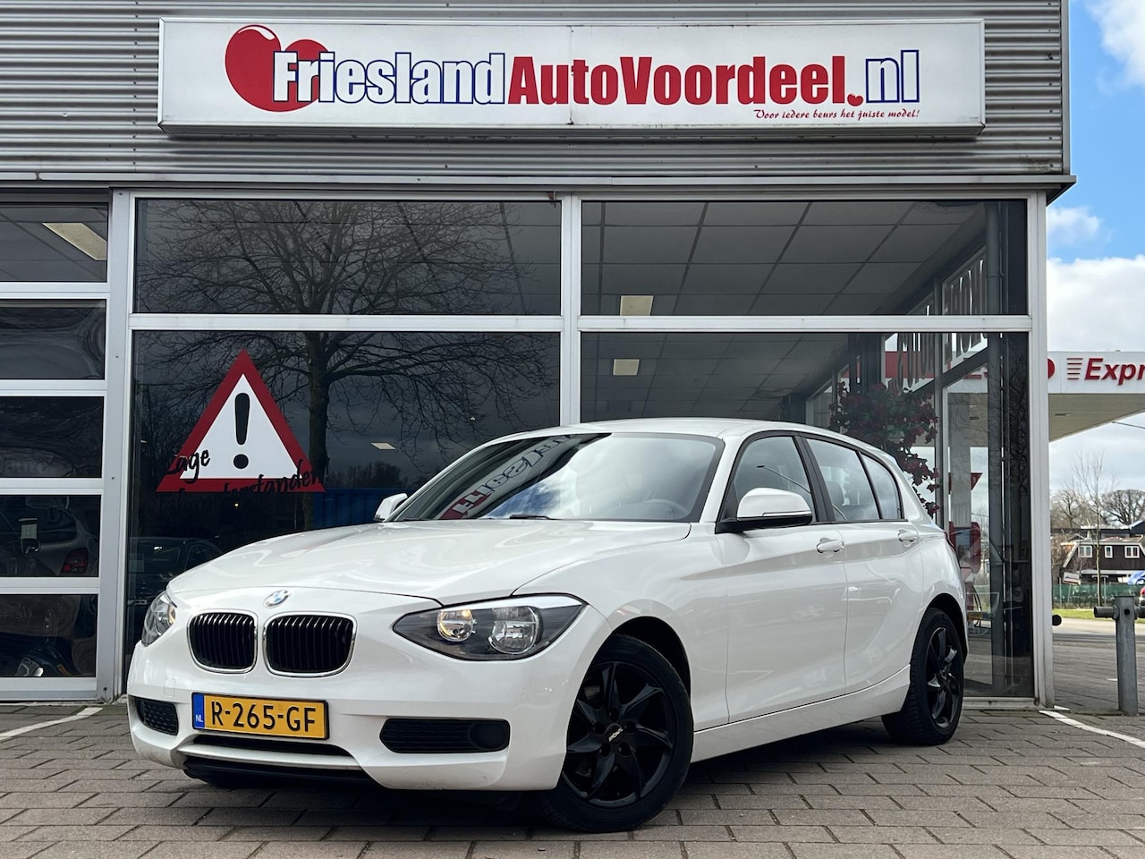 BMW 1-serie - 114i EDE 5 deurs / Airco / PDC / 2012 - AutoWereld.nl
