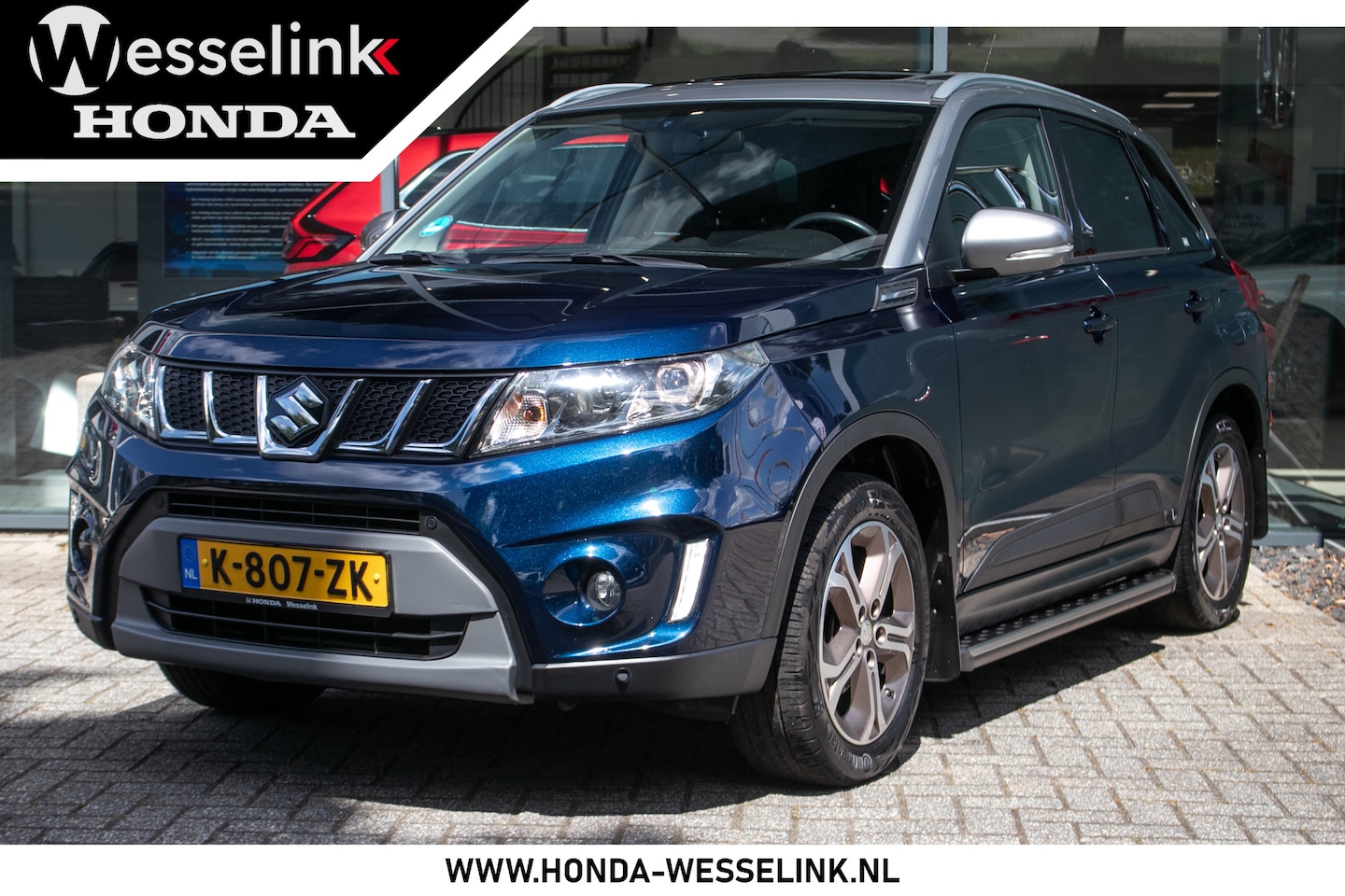 Suzuki Vitara - 1.6 High Executive Allgrip - All-in rijklaarprijs | Afn. trekhaak | Panodak | Navi - AutoWereld.nl