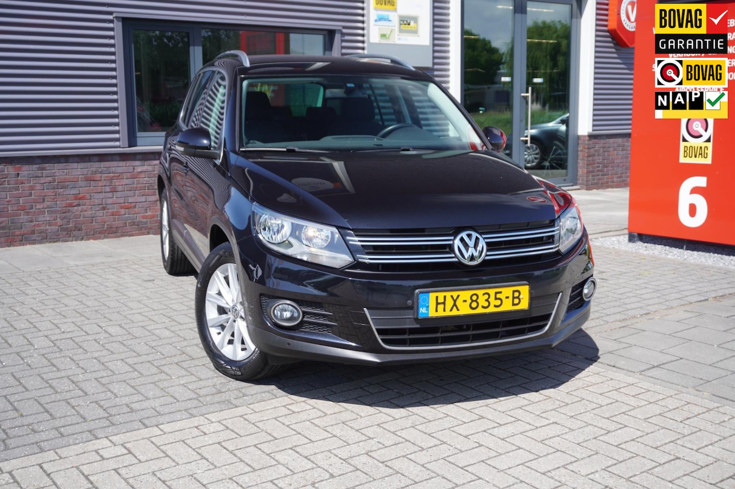 Volkswagen Tiguan - 1.4 TSI Sport&Style / Dealer onderhouden / Orgineel nederlands - AutoWereld.nl