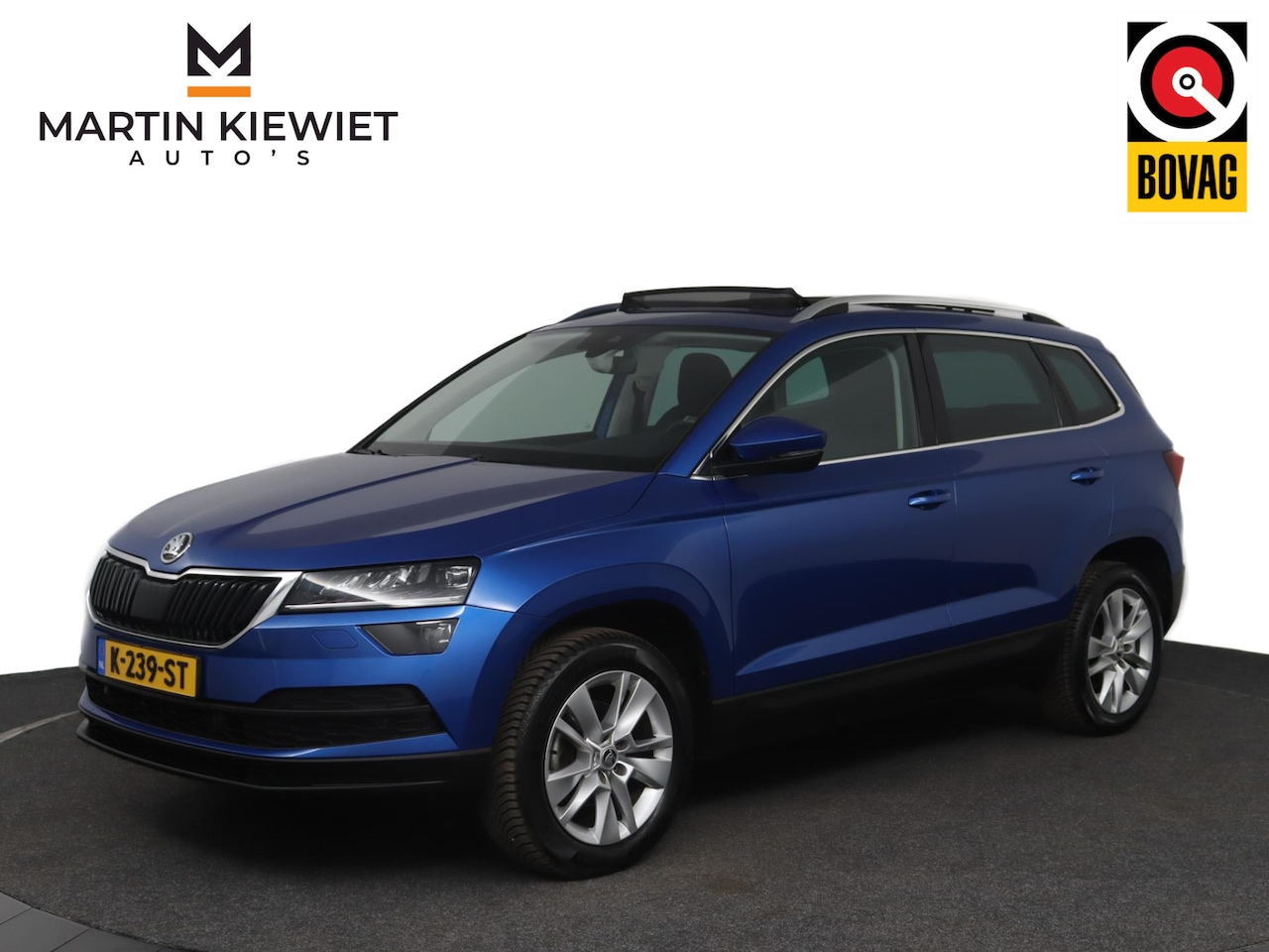 Skoda Karoq - 1.0 TSI Business Edition Plus|Pano|LED|Trekhaak|ACC|Virtual|Stoelverwarming - AutoWereld.nl