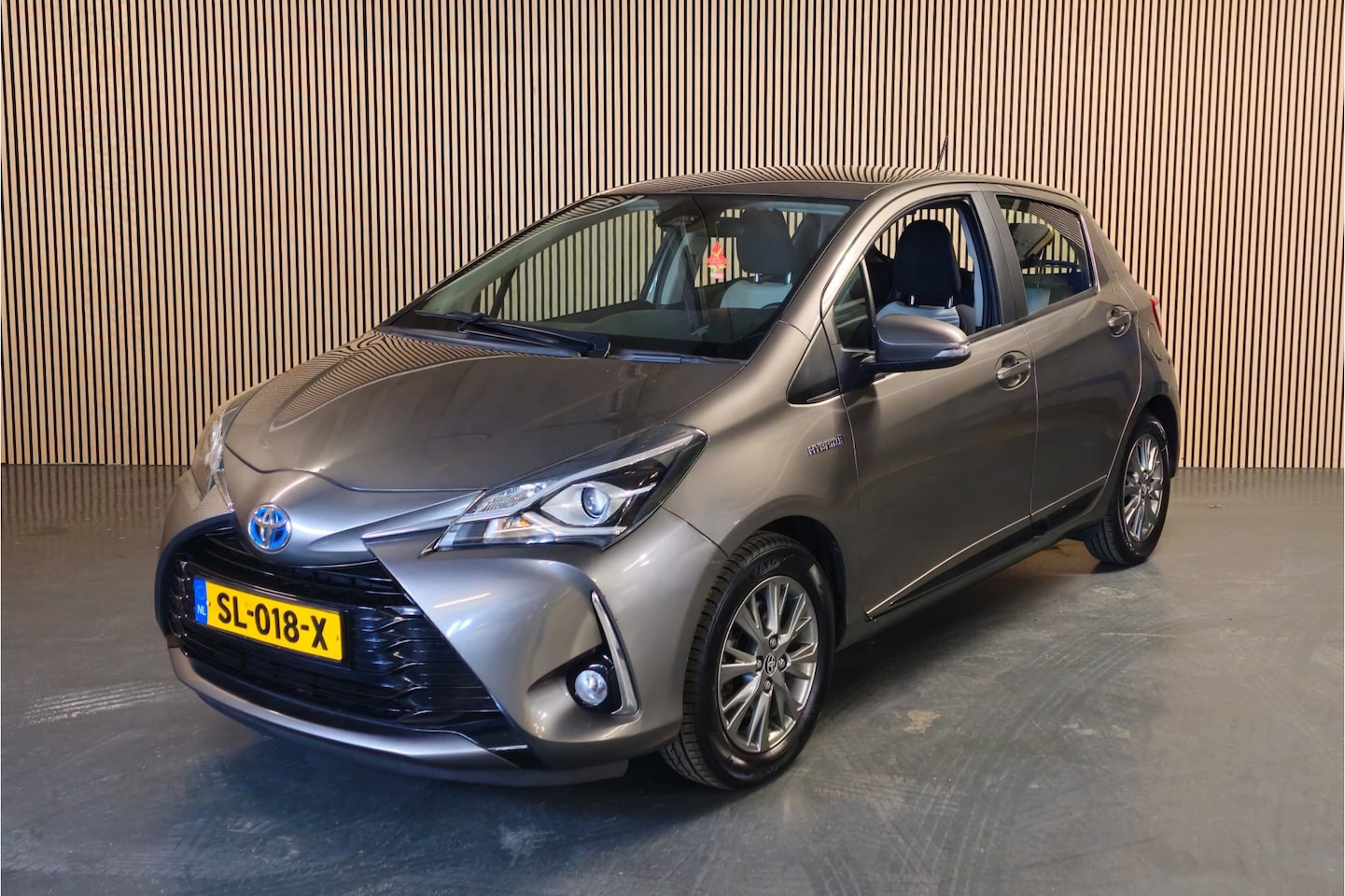 Toyota Yaris - 1.5 Hybrid Aspiration Navi - Achteruitrijcamera - Climate Control - AutoWereld.nl