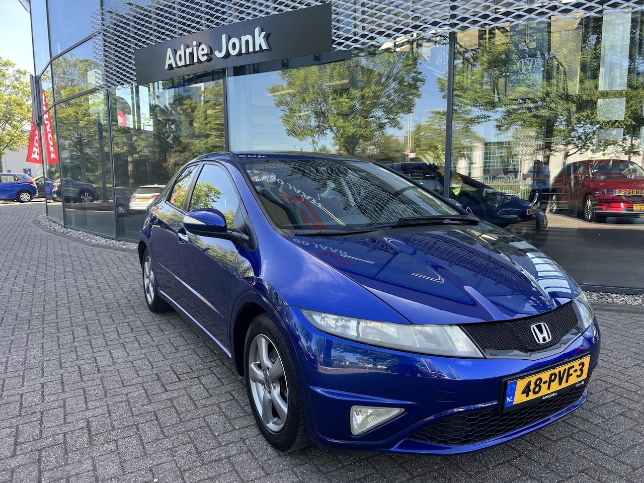Honda Civic - 1.4 Style Mode | AUTOMATISCHE AIRCO | UITNEEMBARE NAVIGATIE | CRUISE CONTROL | PARKEERSENS - AutoWereld.nl