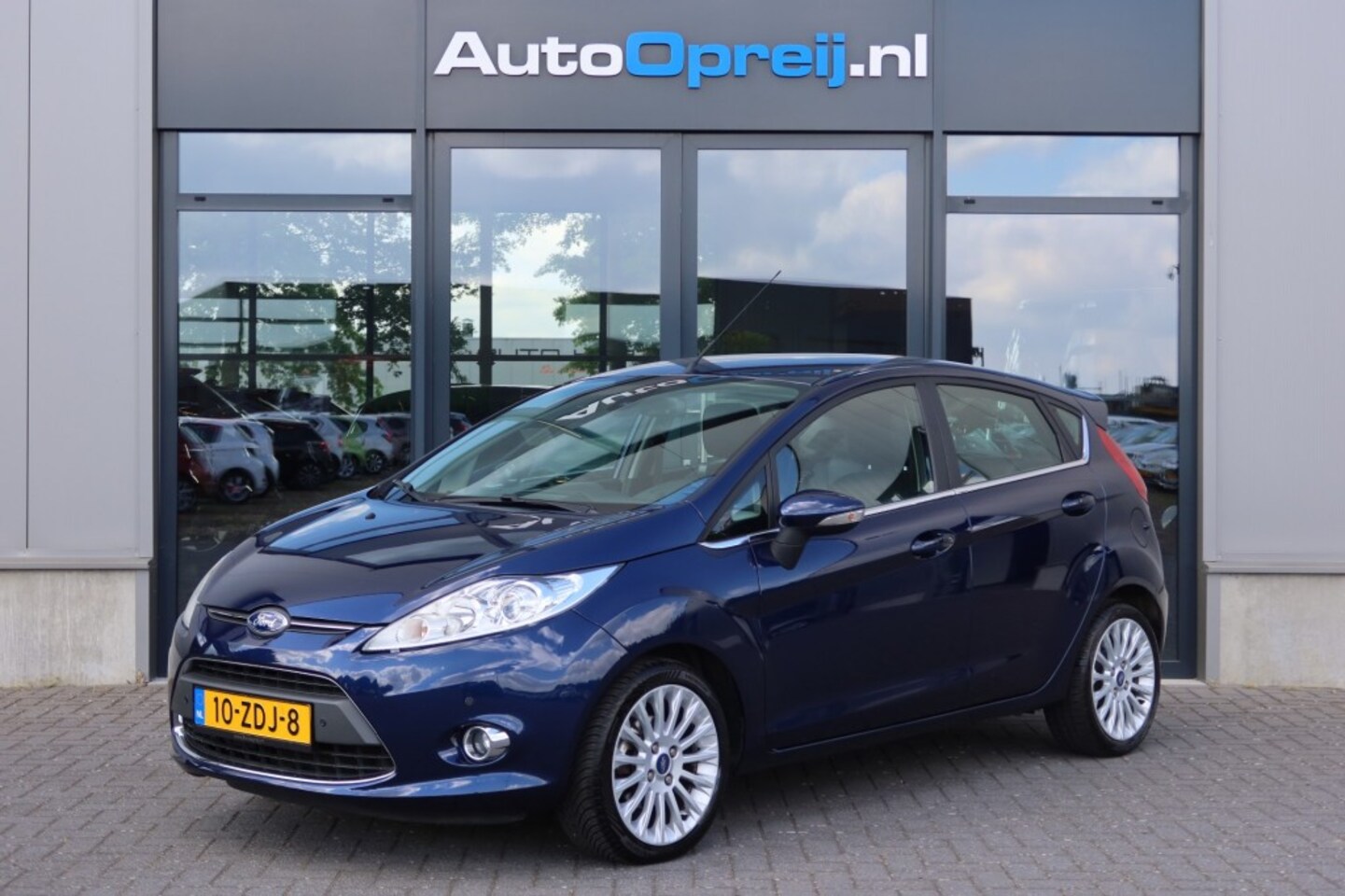 Ford Fiesta - 1.6 Titanium 120pk 5drs. Clima, NAVI, Leder bekl, Stoelverwarmi - AutoWereld.nl