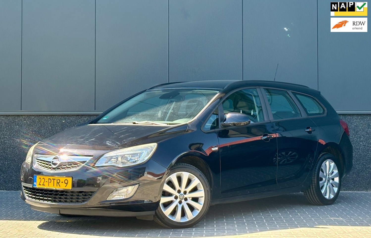 Opel Astra Sports Tourer - 1.4 Edition AIRCO | CRUISE | TREKHAAK | NAP - AutoWereld.nl