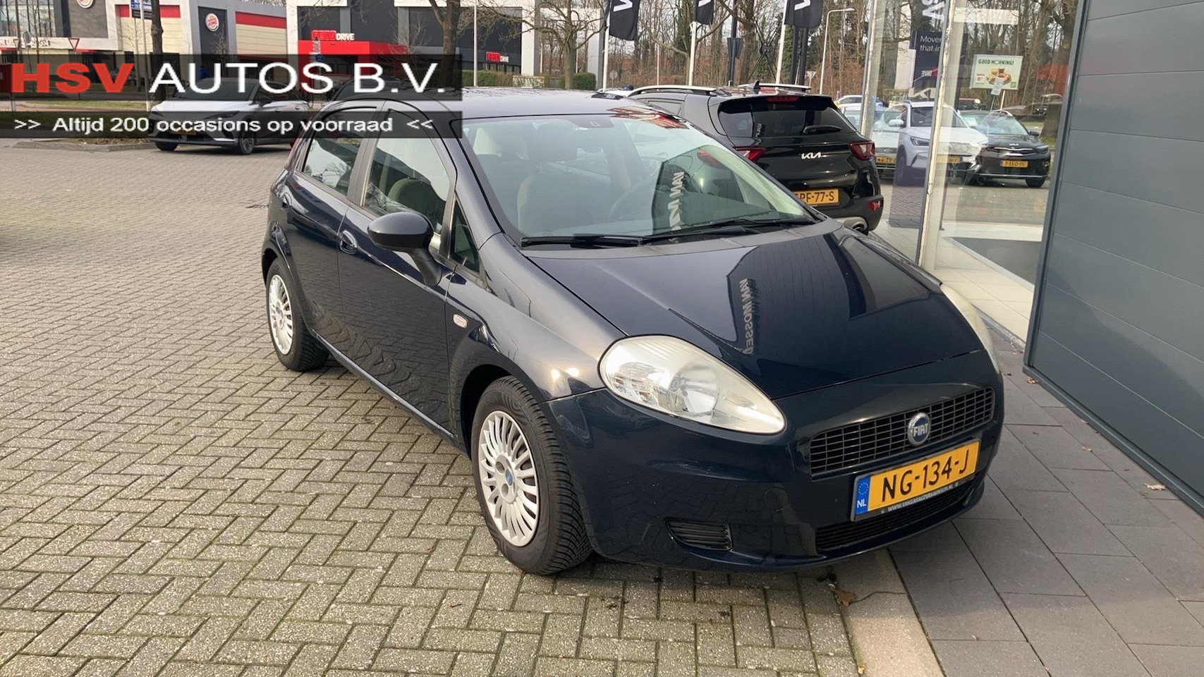 Fiat Grande Punto - 1.2 Active airco 4-deurs 1e eigenaar - AutoWereld.nl